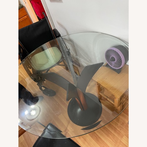 Used Glass Table and Chairs for sale on AptDeco