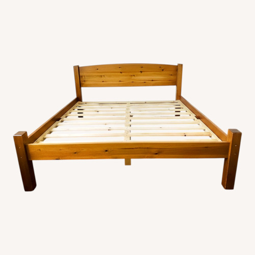 Used Dark Brown Wood Queen Bed With Storage for sale on AptDeco