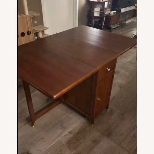 Used Solid Wood Foldable Dining Table for sale on AptDeco