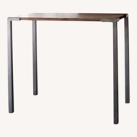 CB2 Stilt Mango Wood Bar Height Table Dining Set