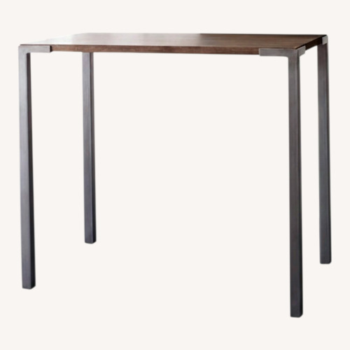 Used CB2 Stilt Mango Wood Bar Height Table Dining Set for sale on AptDeco