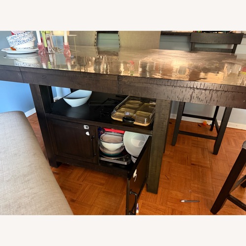 Used Bob's Discount Furniture Dark Brown Dining Table for sale on AptDeco