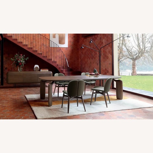 Used Roche Bobois Pulp Dark Brown Wood Dining Table for sale on AptDeco