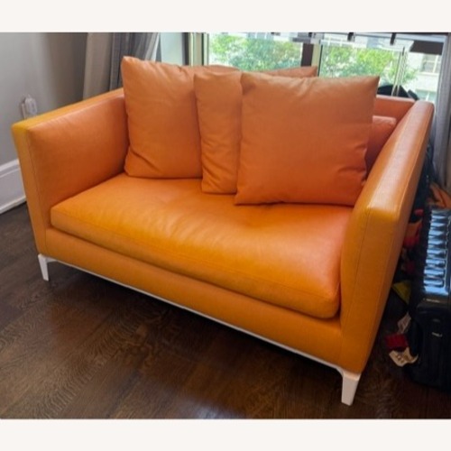 Used Minotti Orange Leather Andersen Lovechair for sale on AptDeco