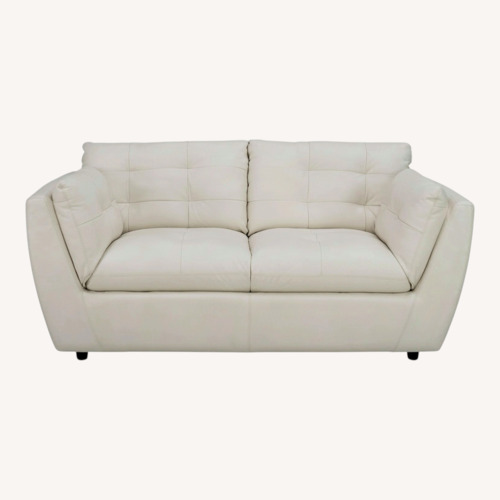 Used Damar Leather Loveseat for sale on AptDeco
