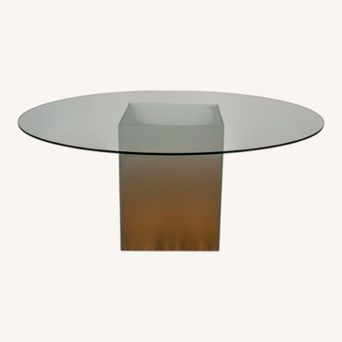 Used Custom Crafted Oval Glass Dining Table for sale on AptDeco