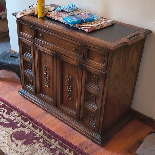Used Vintage/Antique Dark Brown Wood Sideboard for sale on AptDeco