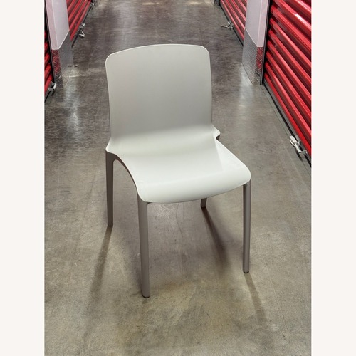 Used Casprini Tiffany Light Gray Plastic Dining Chairs for sale on AptDeco