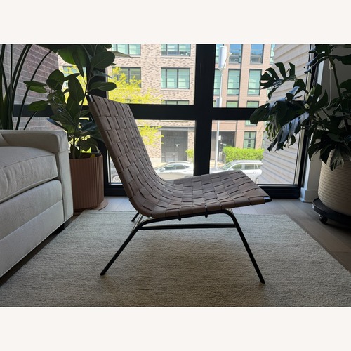Used Pottery Barn Shay Woven Leather Accent Chair for sale on AptDeco