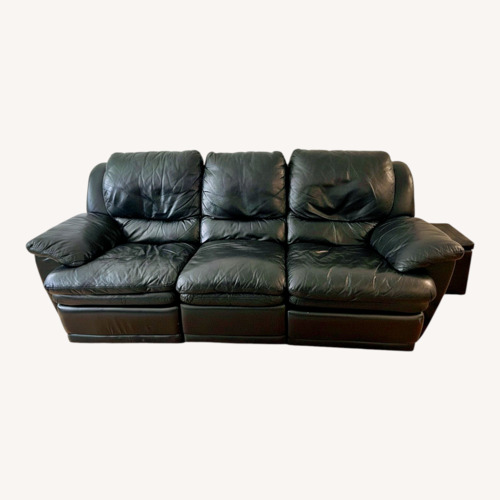 Used Black Leather 2 Piece Sectional for sale on AptDeco