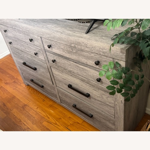 Used Raymour & Flanigan Tundra Light Gray Wood Dresser for sale on AptDeco