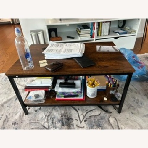 Used Dark Brown Coffee Table for sale on AptDeco
