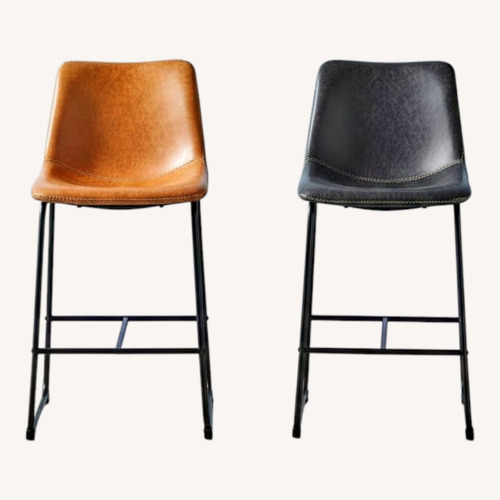 Used Su Casa Light Brown Faux Leather Dining Chairs for sale on AptDeco