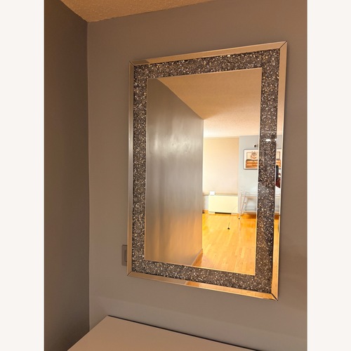 Used Silver Mirrored Glass Wall Mirror for sale on AptDeco