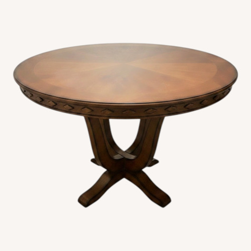 Used Vintage/Antique Dark Brown Dining Table for sale on AptDeco