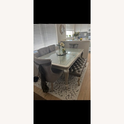 Used Silver Glass Dining Table for sale on AptDeco