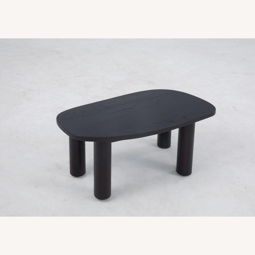 Used Sun at Six Ohm Coffee Table (Black Wood) for sale on AptDeco