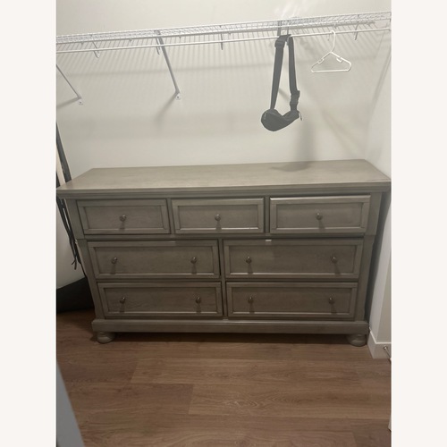 Used Ashley Furniture Lettner Light Gray Wood Dresser for sale on AptDeco