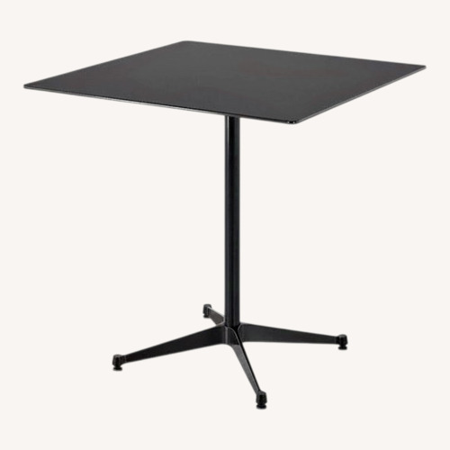 Used Herman Miller Eames Black Wood Dining Table for sale on AptDeco