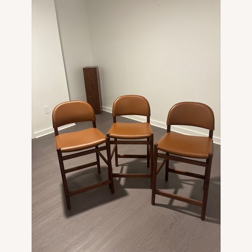 Used Design Within Reach Dark Brown Leather Stools for sale on AptDeco