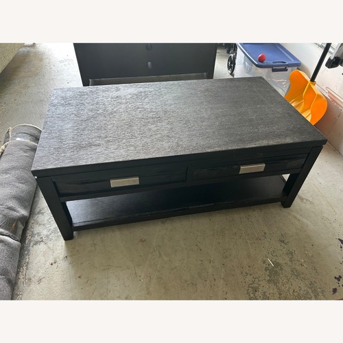 Used Bob's Discount Furniture Elevations Charcoal Storage Coffee Table for sale on AptDeco