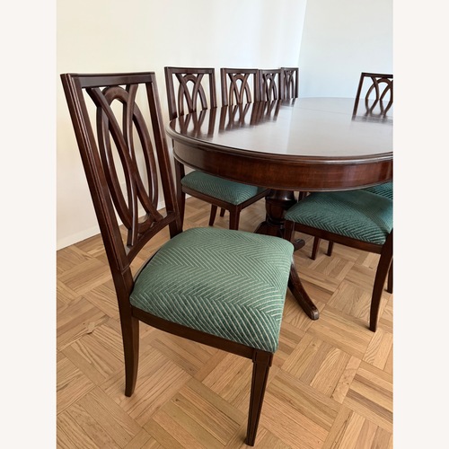 Used Handmade Oval Dining Room Table with 10 Chairs for sale on AptDeco