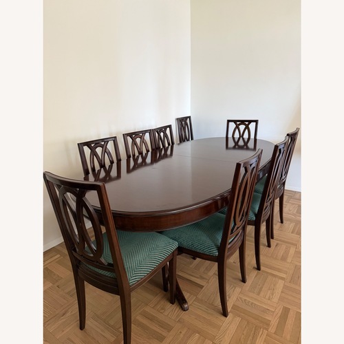 Used Handmade Oval Dining Room Table with 10 Chairs for sale on AptDeco