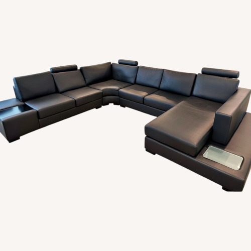 Used Black Leather 4 Piece Sectional for sale on AptDeco