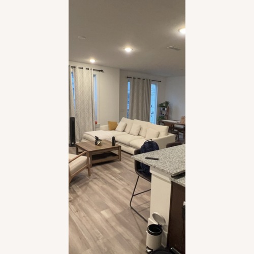 Used Feathers Sectional for sale on AptDeco