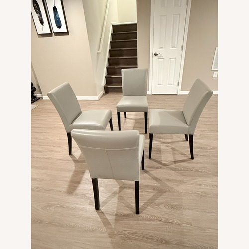 Used Crate & Barrel Lowe Light Gray Leather Dining Chairs for sale on AptDeco