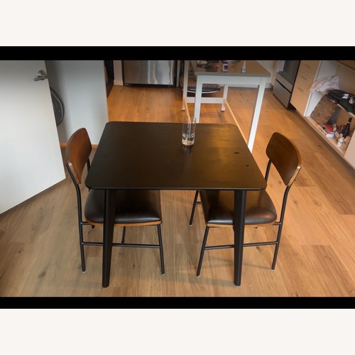 Used IKEA LISABO Black Dining Table for sale on AptDeco