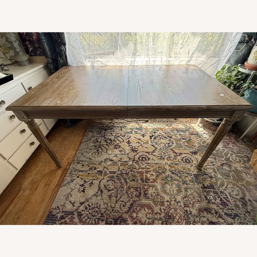 Used World Market Paige Distressed Oak Dining Table for sale on AptDeco