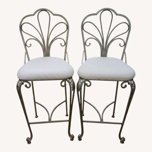 Used Vintage Peacock Style Iron Bar Stools for sale on AptDeco