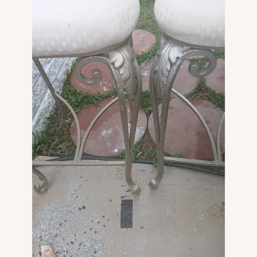 Used Vintage Peacock Style Iron Bar Stools for sale on AptDeco