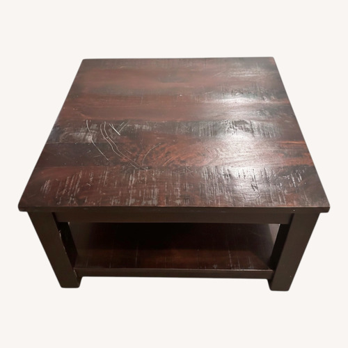 Used Dark Brown Wood Coffee Table for sale on AptDeco