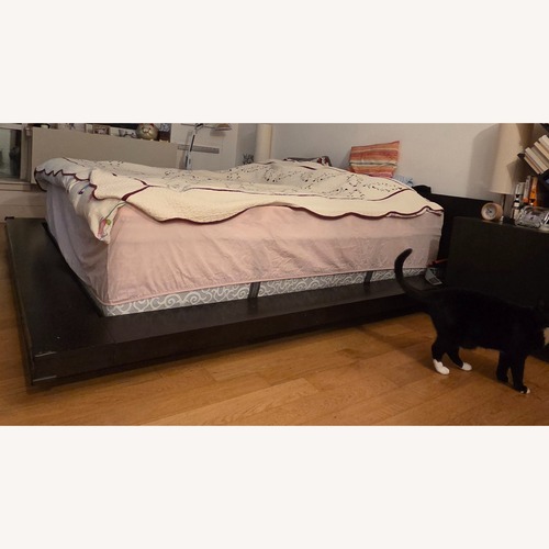 Used  Dark Brown Wood King Bed Frame for sale on AptDeco
