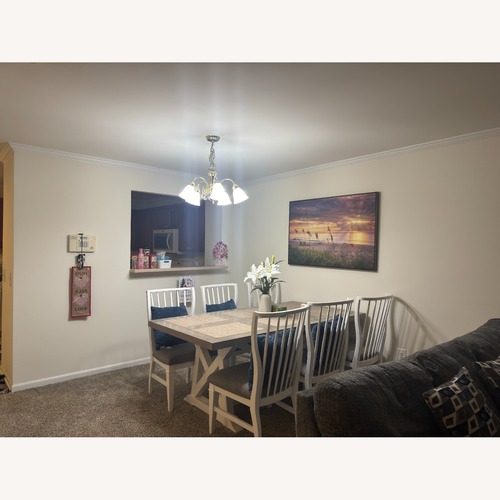 Used Natural Wood Dining Set for sale on AptDeco