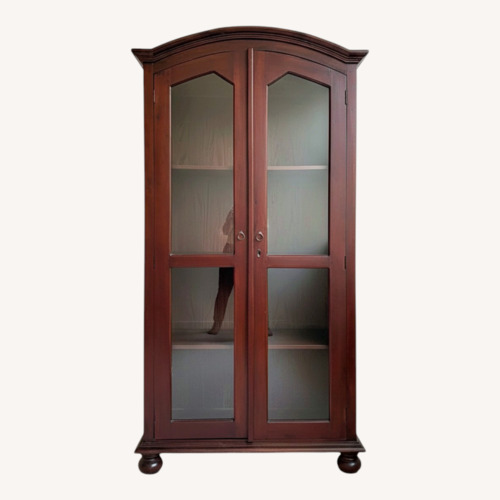 Used Dark Brown Wood Armoire for sale on AptDeco