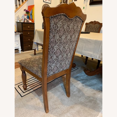 Used Expandable Elegant Dining Table with 6 Chairs for sale on AptDeco