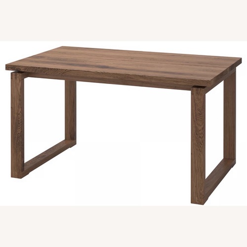 Used IKEA Dark Brown Wood Dining Table for sale on AptDeco