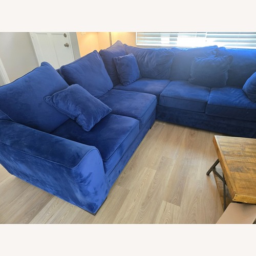 Used Living Spaces Blue Fabric 2 Piece Sectional for sale on AptDeco