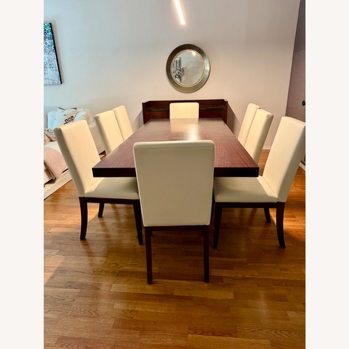 Used Macy's Dark Brown Wood Dining Table for sale on AptDeco