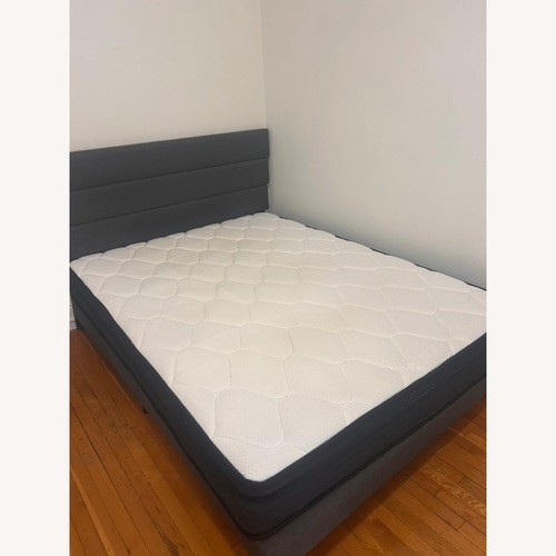 Used Bed Bath & Beyond Black Fabric Queen Bed for sale on AptDeco