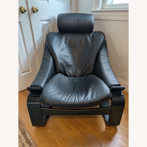 Used Vintage/Antique Black Leather Accent Chair for sale on AptDeco
