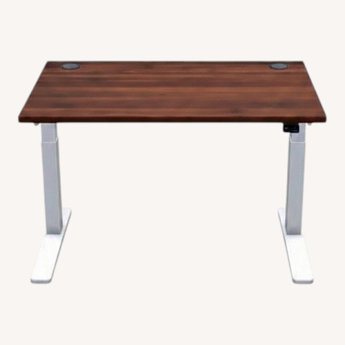 Used Uplift Standing Desk White Wood Veneer Desk for sale on AptDeco