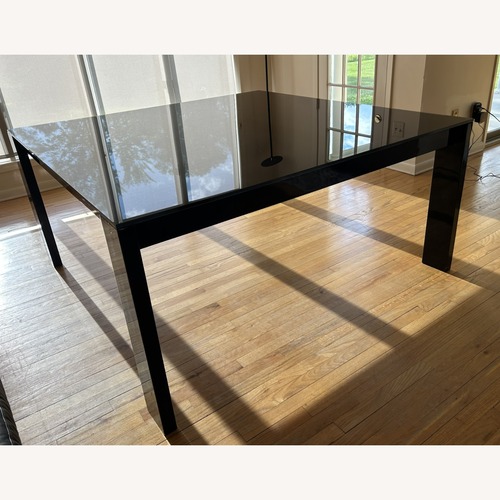Used Black Glass Dining Table for sale on AptDeco
