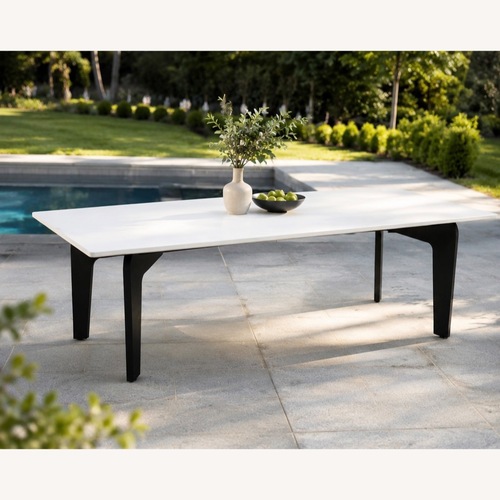 Used CB2 Stone Outdoor Dining Table for sale on AptDeco