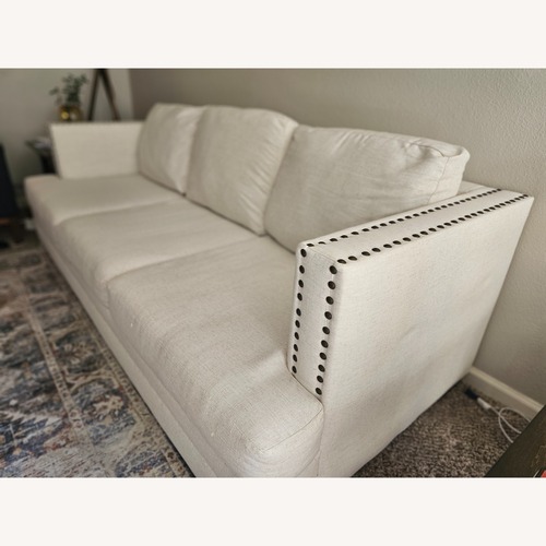 Used Ashley Furniture Ballina White Fabric 3+ Seater Sofa for sale on AptDeco