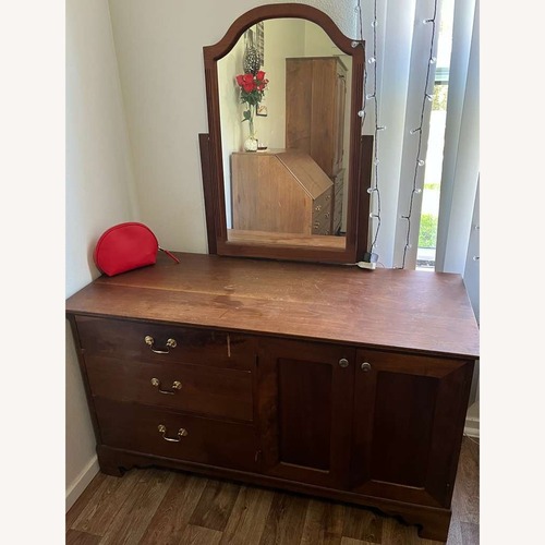 Used Vintage/Antique Finds Dark Brown Wood Dresser for sale on AptDeco
