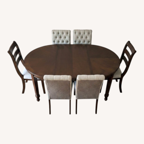 Used Ashley Furniture Dark Brown Wood Dining Sets for sale on AptDeco